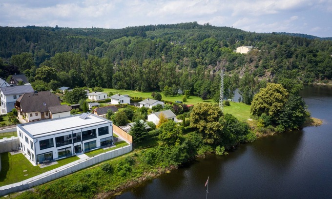 Saaldorf Condo | Apartments -Saaldorf WG 5 with balcony and view of the reservoir
