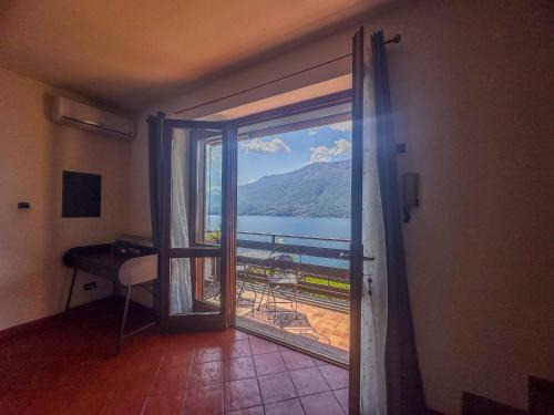 Dorio Apartment | Appartamento a due passi dal lago con box