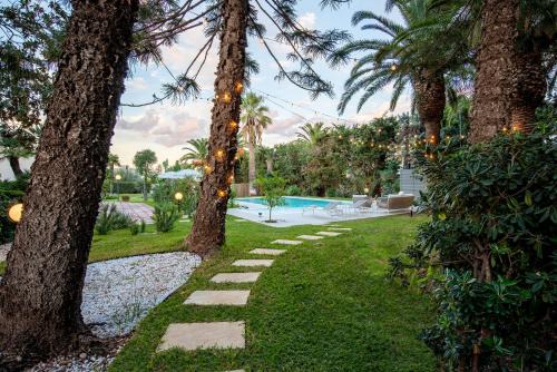 Grottasanta Apartment | Appartamento in Villa con giardino - numeroquattro
