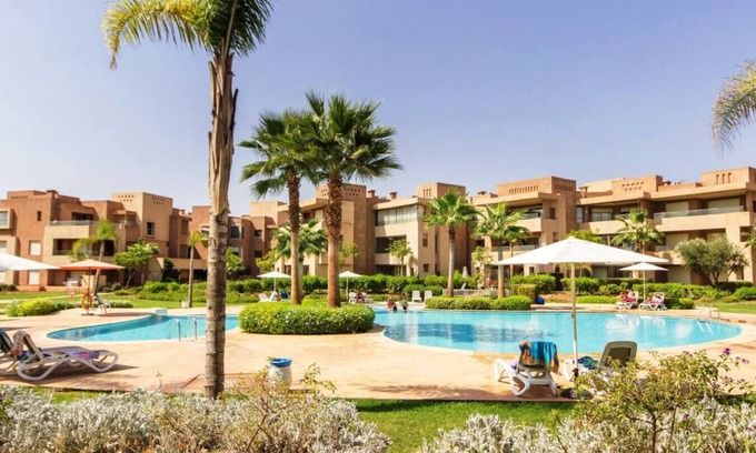 Menara Apartment | Appartement Pied Dans L'eau - Jardin Privée