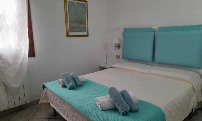 San Teodoro Apartment | Aquamarine villa with garden and wifi