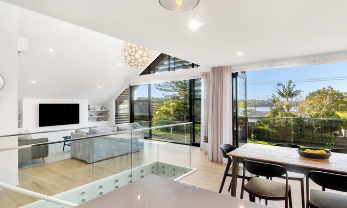 Te Atatu Peninsula House | Architecturally designed stunning trophy home with sea views, on a quiet street.