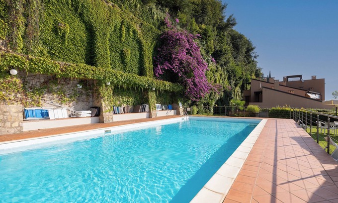 Toscolano Maderno Apartment | At 50 mt from the lake, charming apartment with lake view terrace and swimming pool.