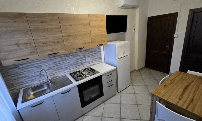 Biancareddu Apartment | Attic family apartment surrounded by nature, 2 minutes from the sea.