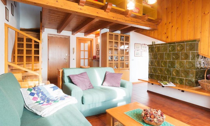 Ragoli Apartment | Attico Abbraccio di Luce