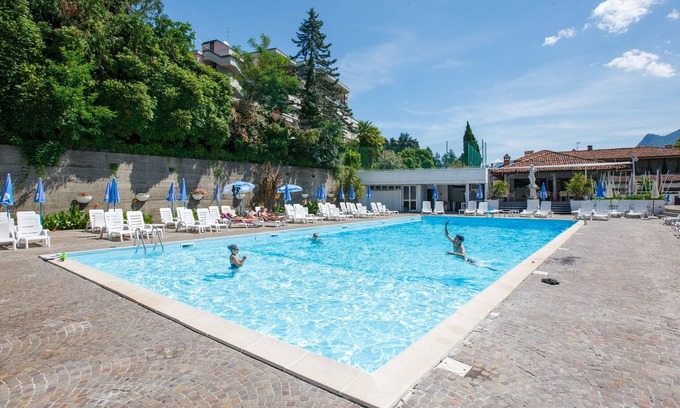 Susello Apartment | Attractive studio with terrace and garden, pool and dream view