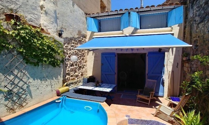 Pouzolles House | Atypical village house with swimming pool amidst vineyards