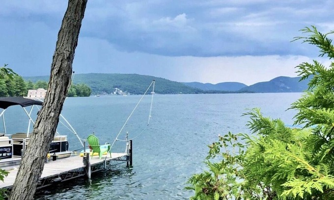 Warren County Cabin | Authentic seasonal 1950’s Adirondack live edge /knotty Pine waterfront cabin.