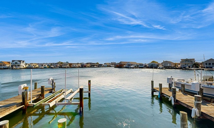 Montego Bay House | Bayfront mobile home with private dock, shared pools, & tennis court