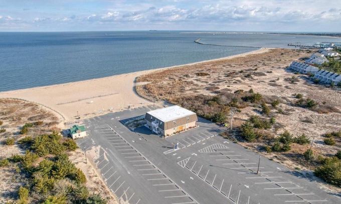 Lewes Condo | Beach Front condo. Private parking. Steps to the beach.