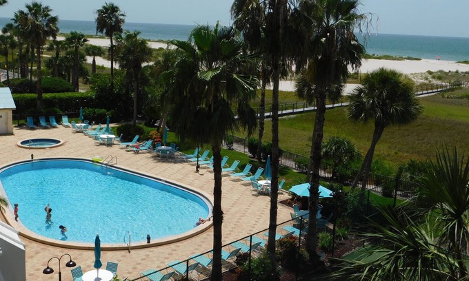 Sand Key Condo | Beach Paradise Breathtaking Sunset Beach View Pool Hot tub Private