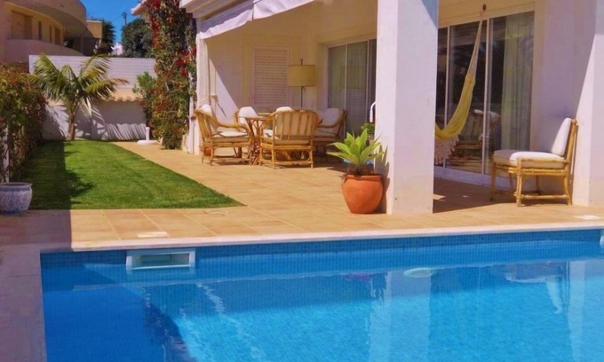 Meia Praia Apartment | Beachfront Apartment with Private Pool, BBQ, and Sea views