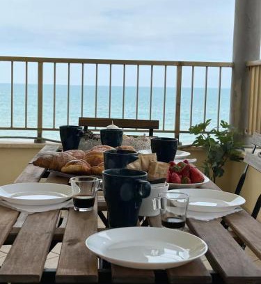 Torvaianica Apartment | Beachfront, balcony, parking, private access Beach