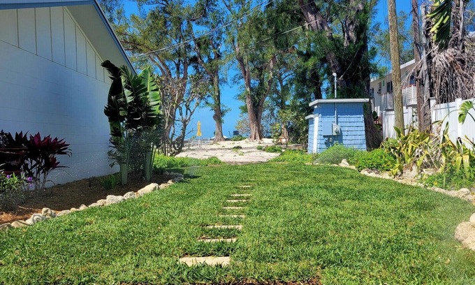 Holmes Beach Apartment | Beachfront Bliss at Bamboo Apartments #2– A Hidden Gem on Anna Maria Island!