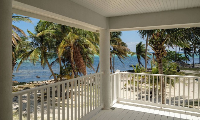 Blossom Village Villa | Beachfront Two-Bedroom Villa- Wake up to the sound of the waves