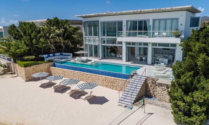 Savaneta House | Beachfront Villa Infinity Pool, Gym, Media room. 6 Bedrooms 7 baths. Sleeps 13