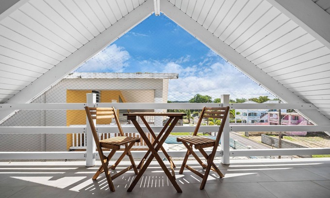 Espinar Apartment | Beachfront | With Pool | Free Parking | Private Balcony