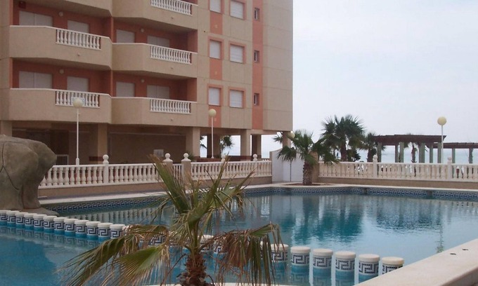 San Javier Apartment | Beachside Apartment with Pool, Terrace & Parking, 2-BR, La Manga, Pets Allowed