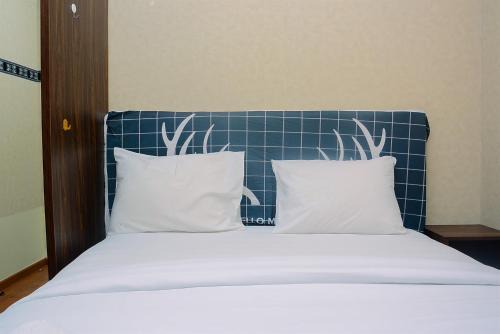 Pluit Apartment | Beautiful 2BR with Direct Access to Pool Green Bay Pluit Apartment By Travelio