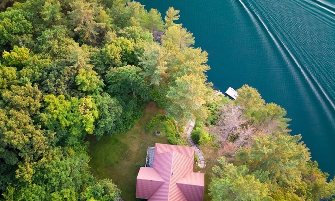 Seguin Cottage | Beautiful 5 bedrooms waterfront cottage sits on a private 4 acres wooded lot!