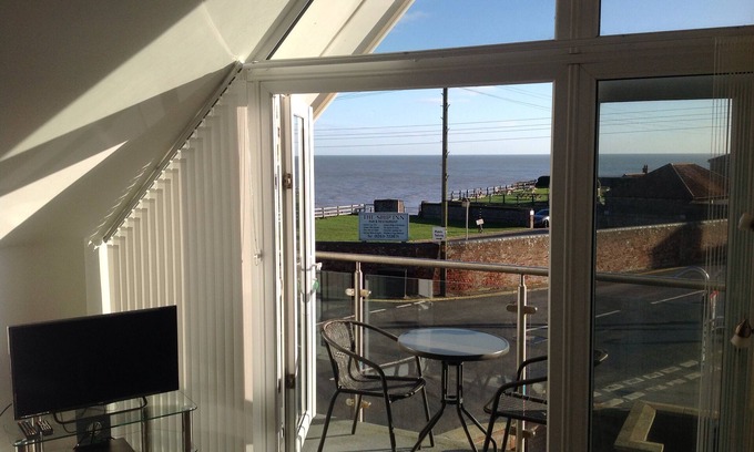 Mundesley Apartment | Beautiful apartment, sea view from the balcony, vaulted ceilings, well equipped