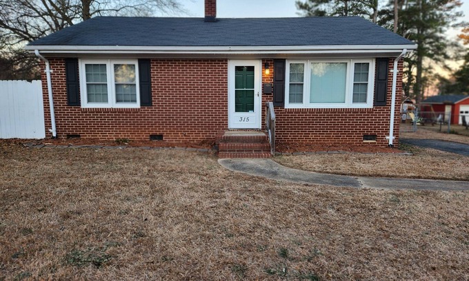 Roanoke Rapids House | Beautiful Brick Home in Walking Distance to Lake Beach Area