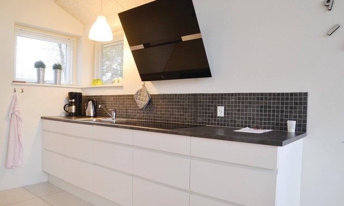 Brande House | Beautiful cottage in a unique location right by the river Skjern Å with good fishing grounds.