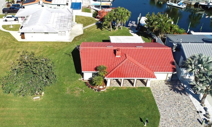 New Port Richey House | Beautiful home on a deep water canal leading to the Gulf of Mexico.