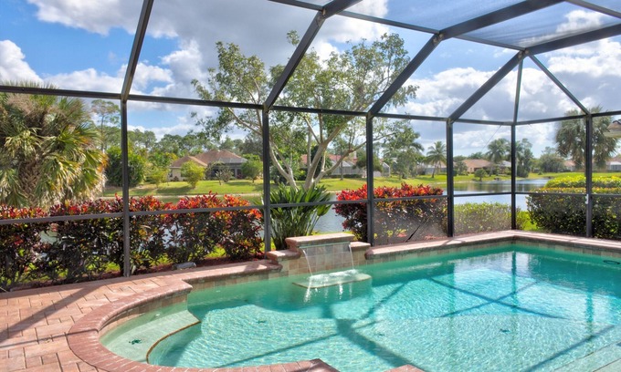 Central Naples House | Beautiful lake view with large lanai & heated private pool, 10 mins to beach!