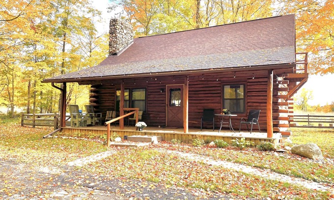 Lawrence Cabin | Beautiful log cabin with all the creature comforts of home. Private fishing lake