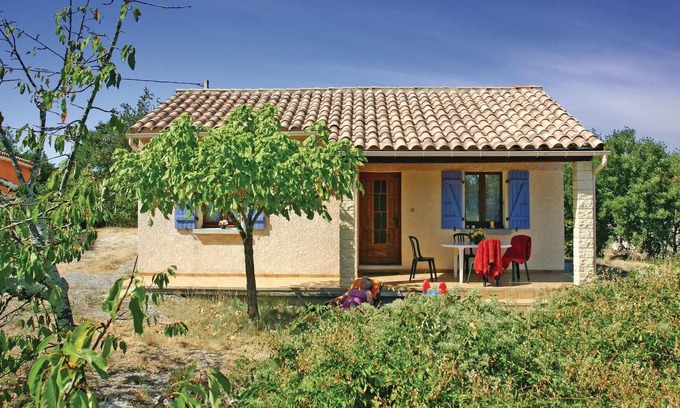 Labeaume House | Beautiful Provencal style house with exposed wooden beams and open terrace.
