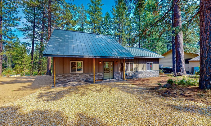 Three Rivers House | Beautiful riverfront home with private dock, fireplace, WiFi, and patio