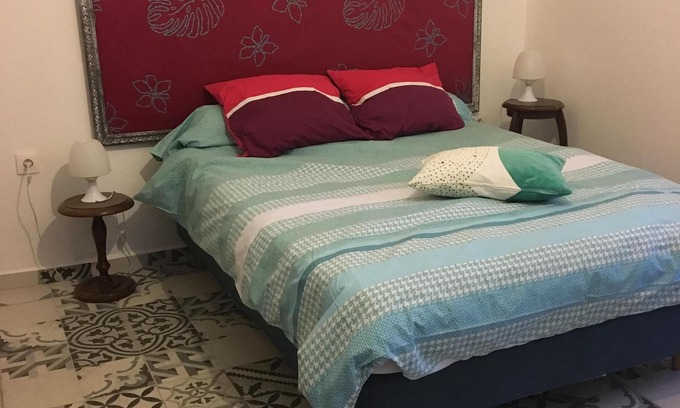 Saint-Jean-du-Pin Bed & Breakfast | Bedroom and terrace, overlooking the garden. It can be combined with the gîte.