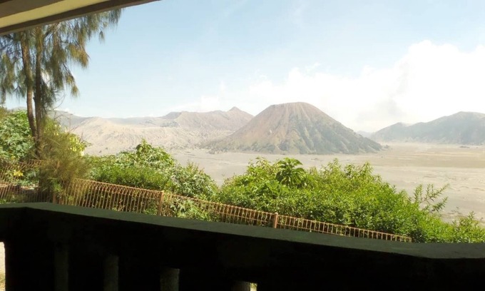 Tengger Caldera Bed & Breakfast | Bedroom for 4 person view direct to Mt. Bromo