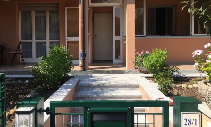 Castel San Pietro Terme Apartment | Bedroom with two single beds