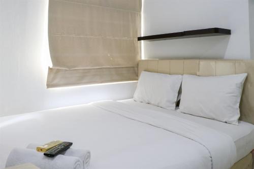 Pluit Apartment | Best Price and Strategic 2BR Green Bay Pluit Apartment By Travelio