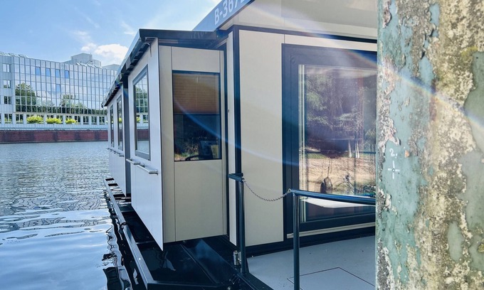 Zeuthen Boat Rental | Boat 'Hausboot Tegel' with Lake View, Wi-Fi and Air Conditioning