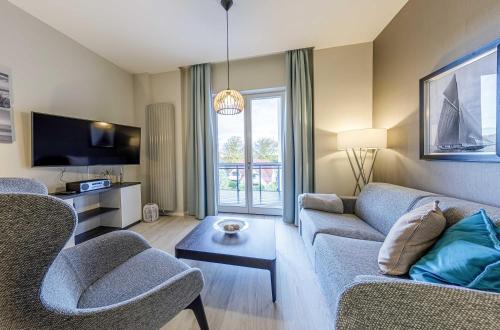 Ostseebad Wustrow Apartment | Boddenzeit - Moderne Ferienwohnung mit Nordbalkon, Wellnessbereich und Nähe zum Ostseestrand