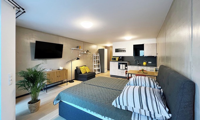 Wachtberg Apartment | Bonquartier | Design apartment with balcony, parking space + charging station