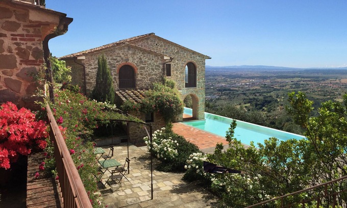 Giugnano Villa | Borgo in Montalbano by Secret Hills, villa with waterfall pool with view