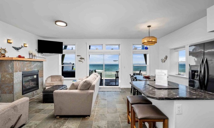 Lincoln Beach House | Boundless Ocean Views From Home and Hot Tub, Pet Friendly, Private Deck, Fireplace, Steps to Beach
