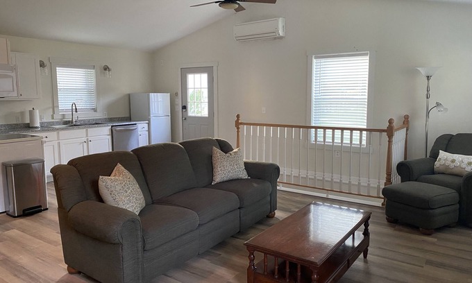 Calvin Cottage | Bright carriage house steps from rail trail and river & 45 minutes to Penn State