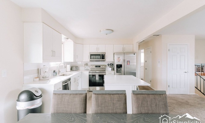 Wheat Ridge Apartment | Bright & Chic Getaway Game Room Covered Deck