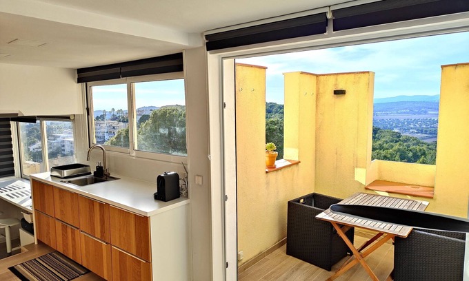 Vallpineda Apartment | Bright renovated apartment with views of the vineyards and sea plus pool