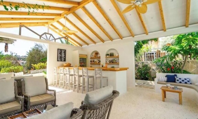 Patara Villa | Bright rooms, landscaped garden.