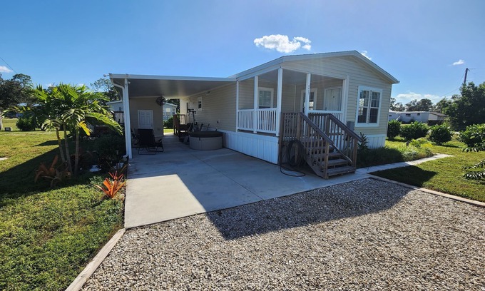 Suncoast Estates House | Buddy Ebson w/EV charger II