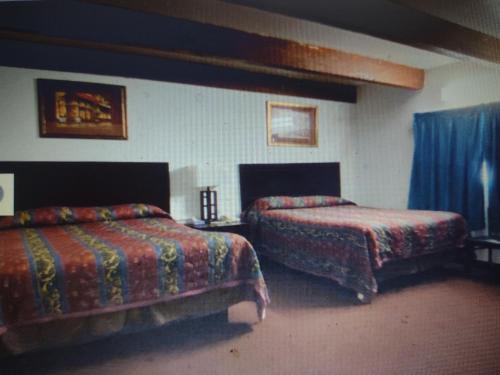 Freer Hotel | Budget Inn & Suites - Brand New Super-Comfortable Rooms & The Lowest Best Price plus HBO Max TV free!
