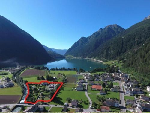 Le Prese House | Bungalow Miralago in Camping Cavresc, Via dal Cavresc 1, 7746 Le Prese-Poschiavo