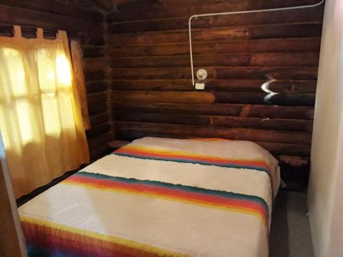 San Marcos Sierra Hotel | Cabañas arco iris