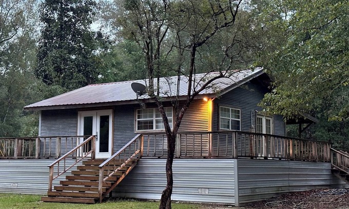 Perkinston Cabin | Camp House on Red Creek - Uncle Ralph’s Cabin Rentals - PRIVATE BEACH